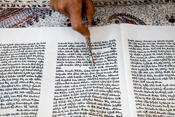 Woman reading the Tora in  Jerusalem, Israel.