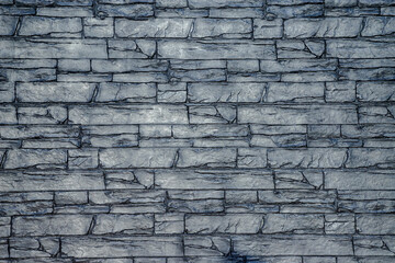 Texture of printed cement stone imitation on a wall