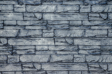 Texture of printed cement stone imitation on a wall