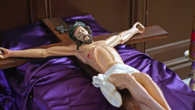 Catholic Church Crucifix with Figure of Jesus Christ put on Display for Prayer and Adoration on Easter Holidays - Powered by Adobe