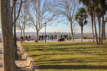 people gathering in a park in Madrid