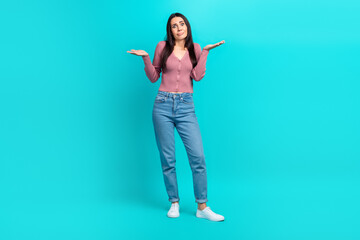 Full length photo woman youngster wear casual style shrug shoulders no idea confused staring dont know answer sorry isolated on cyan color background - obrazy, fototapety, plakaty