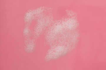abstract white foam in pink background