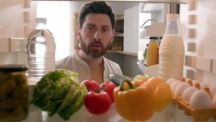 Point of view POV inside refrigerator Caucasian man husband guy male homeowner chef open fridge full of healthy fresh vegetables check ingredients checking meal at home kitchen planning food delivery