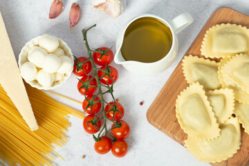 Italian food or ingredients background with fresh vegetables, pasta, cheese parmesan