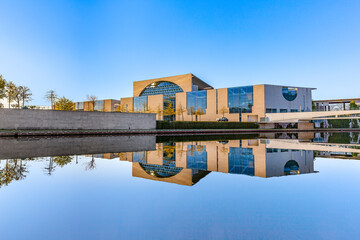 The german chancellery building at river Spree with reflection in early morning