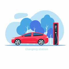 Electric car is charging. Electric car with charging station. The concept of charging an electric car.
