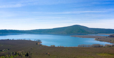 Aerial view of Lake Vico. It is a volcanic lake in the northern Lazio region, central Italy. It is one of the highest major Italian lakes and occupies the central caldera of Vico Volcano.