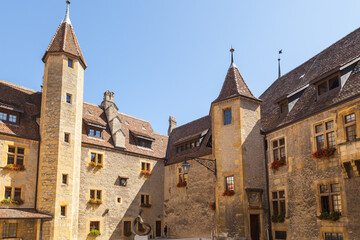 Outdoor View of Colorful Classic Castle Exteriors Walls and Windows in old town Neuchatel, Switzerland, Europe.