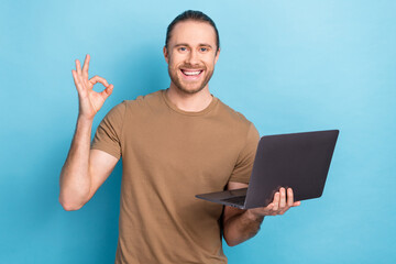 Photo advertisement of young copywriter brunet hair showing okey symbol hold laptop recommend new...