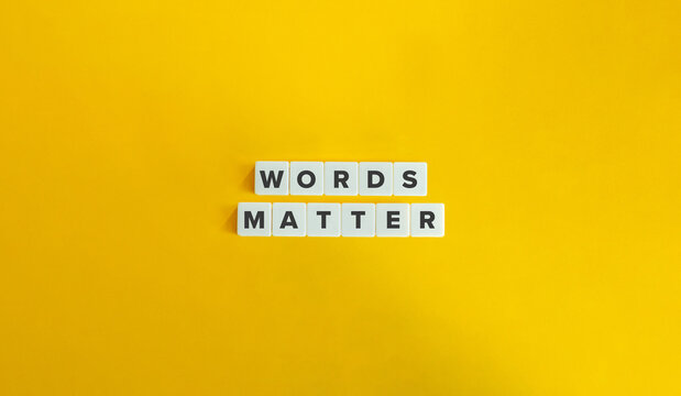 Words Matter Banner. Message on Block Letter Tiles on Yellow Background. Minimal Aesthetics.