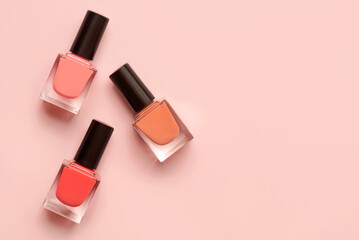 Top view of three matte nail polishes of different colors with copy space for text. Manicure and pedicure concept