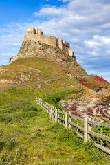 Approach to Lindisfarne Castle on Holy Island, off the Northumberland coast in the north east of England.