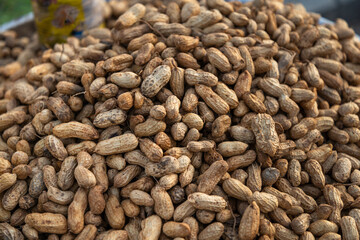 Raw Peanuts in their shells,stacked up on display outdoors,Phnom Penh,Cambodia.