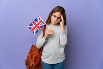 Child holding an United Kingdom flag over isolated background with headache