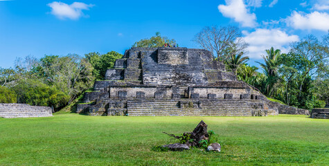 A view down the second plaza in the ancient Mayan city ruins of Altun Ha in Belize on a sunny day