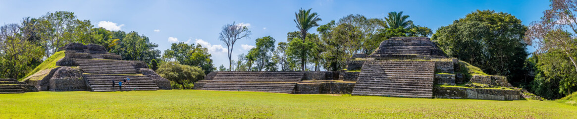 A panorama view across the first plaza in the ancient Mayan city ruins of Altun Ha in Belize on a...