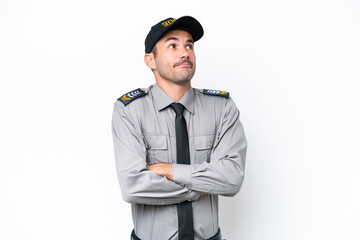 Young safeguard man over isolated white background making doubts gesture while lifting the shoulders