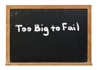 Obraz premium Too Big to Fail written in white chalk on a black chalkboard isolated on white