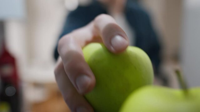 Shelf, Young owner Concentratedly Opens the refrigerator, extends his hand In a private house. In slow motion Underage owner Picking an apple In the refrigerator compartment, restocking
