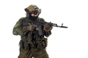 Cropped photo of a russian mercenary soldier with AK-74 in his hand and aiming in enemy.