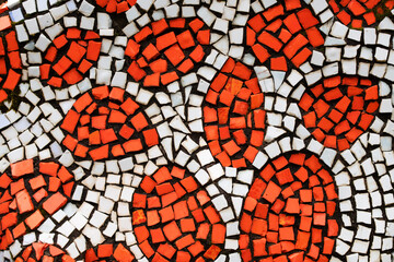 Detail of a beautiful bright multi-colored mosaic of the Soviet era. Abstract texture background from decorative geometric stones