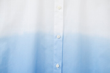 Full frame of Buttons down shirt.close up.