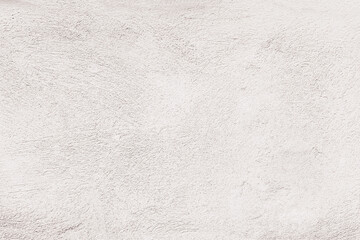 Empty concrete wall covering by white plaster.