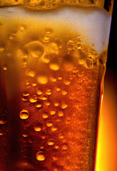 Amber back lighted frosty drink glass. Close up macro image texture with Generative AI Technology