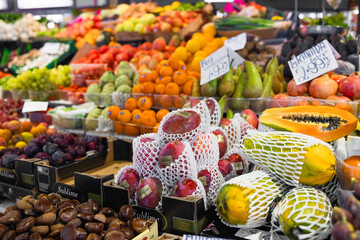 Fruits and vegetables stall in La Boqueria, the most famous market in Barcelona. One of the oldest markets in Europe that still exist. Established 1217. High quality photo