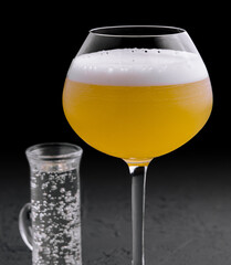 refreshing passionfruit martini cocktail on stone