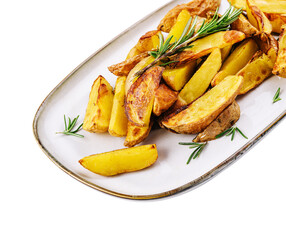 Fried potatoes with rosemary on plate