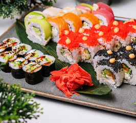 Fresh sushi traditional japanese food on big plate