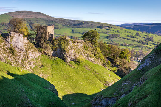 The ruins of Peveril Castle above Cave Dale near Castleton in the Peak District National Park, Derbyshire. Taken just after sunrise.