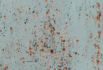 Rusty metal painted background. Rust spots and streaks on stained metal surface. Grunge industrial...