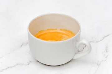 Cup of coffee latte cappuccino on marble table.