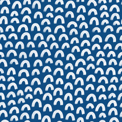 Block print rainbows pattern on blue