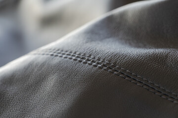 Closeup full grain gray brown leather clothes background
