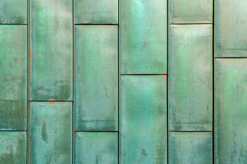 Texture of copper plates with oxidized verdigris layer