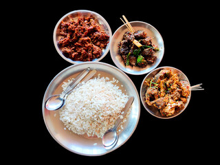 Nepali Newari Khaja Set, Newari special food with Bitten rice, Beef, Peanuts, Buff Choila,beef sukuti.Nepali traditional food.