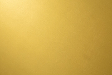 Gold background, gold polished metal, steel texture.