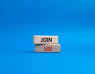 Join us symbol. Concept word Join us on wooden blocks. Beautiful blue background. Business and Join us concept. Copy space