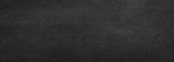 black concrete wall, stone grunge texture, dark gray rock surface background panoramic wide banner	