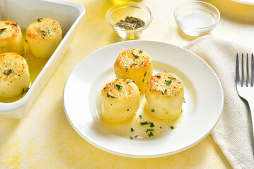 Fondant potatoes on plate