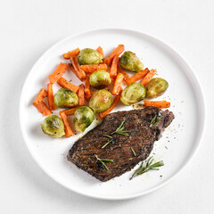 Beef steak with brussels sprouts and sweet potatoes