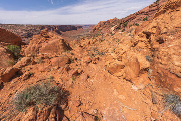 hiking the syncline loop trail in island in the sky district of canyonlands national park, utah, usa