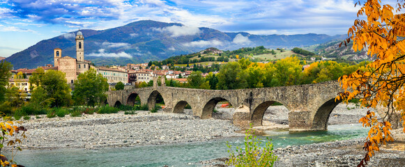 Bobbio - beautiful medieval village (borgo) of Emilia-Romagna in Italy. Panorama of old town and ancient bridge