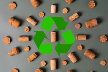 Recycling symbol and wine cork for secondary use.