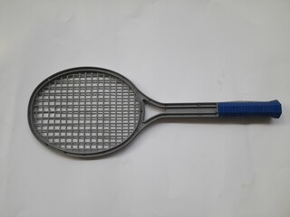 plastic badminton racket top view on white background. background concept of children toys, sport, match, versus, healthy, health, recreation, fairplay, lifestyle, tournament, victory, championship