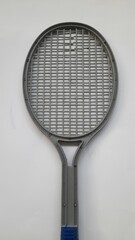 plastic badminton racket top view on white background. background concept of children toys, sport, match, versus, healthy, health, recreation, fairplay, lifestyle, tournament, victory, championship